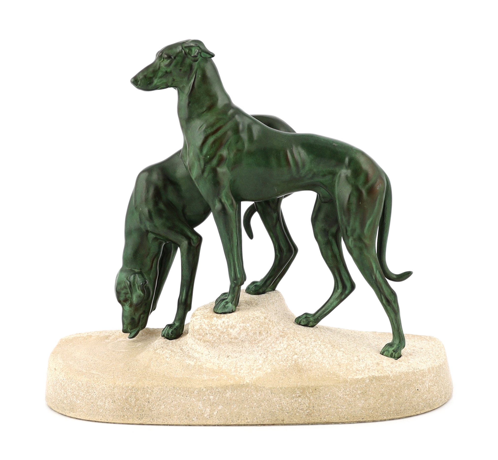 Masson, a French Art Deco bronze and composition stone group of two hounds watering, 32cm long, 12cm deep, 28cm high